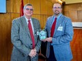 Mike Phillips, left, with the interim Crop, Soil and Environmental Sciences Department head, Trent Roberts, is director of the Alabama Cooperative Extension System.