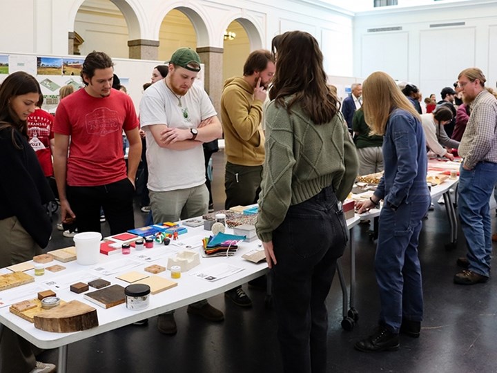 Students learn about sustainable materials during an Earth Day event hosted April 22 by the Fay Jones School of Architecture and Design, held in the second floor gallery of Vol Walker Hall.