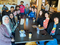 Immersive Arabic I students and instructor Hawraa Alzouwain in their last meeting of the semester at Puritan Coffee.