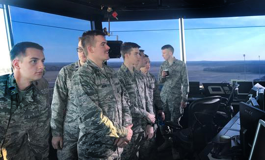Photo of Air Force ROTC cadets in a control tower.