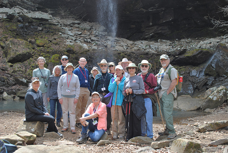 As part of an Osher Lifelong Learning Institute course, hikers visit the base of Sweden Creek Falls.