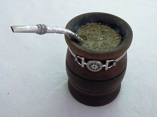 cup with yerba mate and spoon