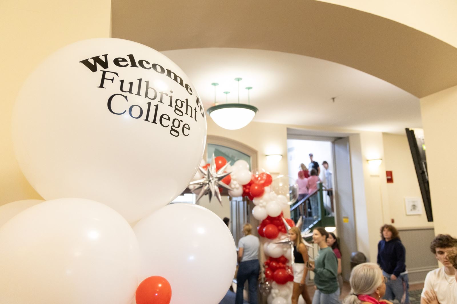 Red and white balloons festoon the hallway entrance to Old Main's second floor