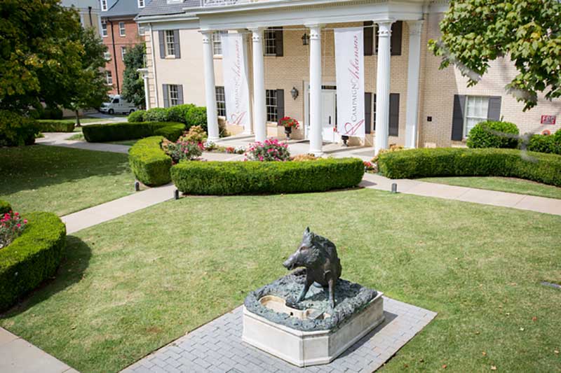 Exterior view of Unity House with the Il Porcellino fountain in foreground