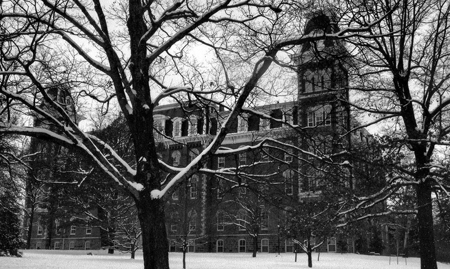 Photo of Old Main in snow.