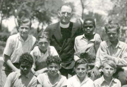Father Flanagan and several boys of Boys Town.