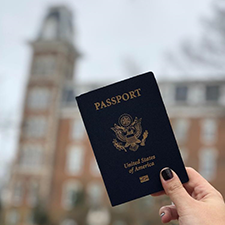 stock image of passport and old main