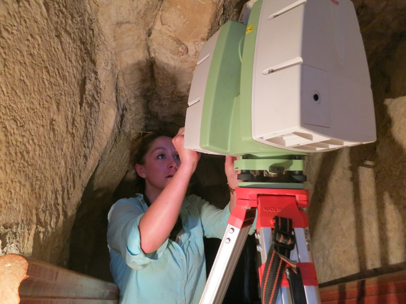 Caitlin Stevens, a researcher at the Center for Advanced Spatial Technologies at the University of Arkansas, programs a laser scanner inside the burial chamber in the Meidum pyramid.