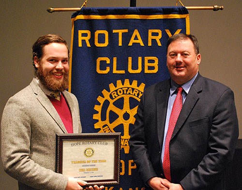 Will Chesher, left, receives the award presented by Bobby Hart, Hope superintendent and president of the Hope Rotary Club.