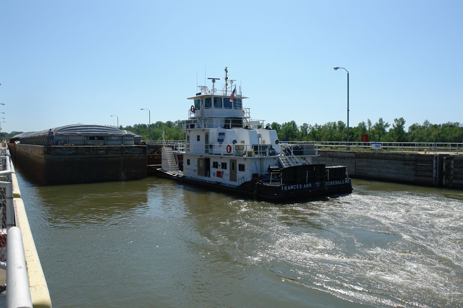 A tugboat and barge in the McClellan-Kerr Arkansas River Navigation System.