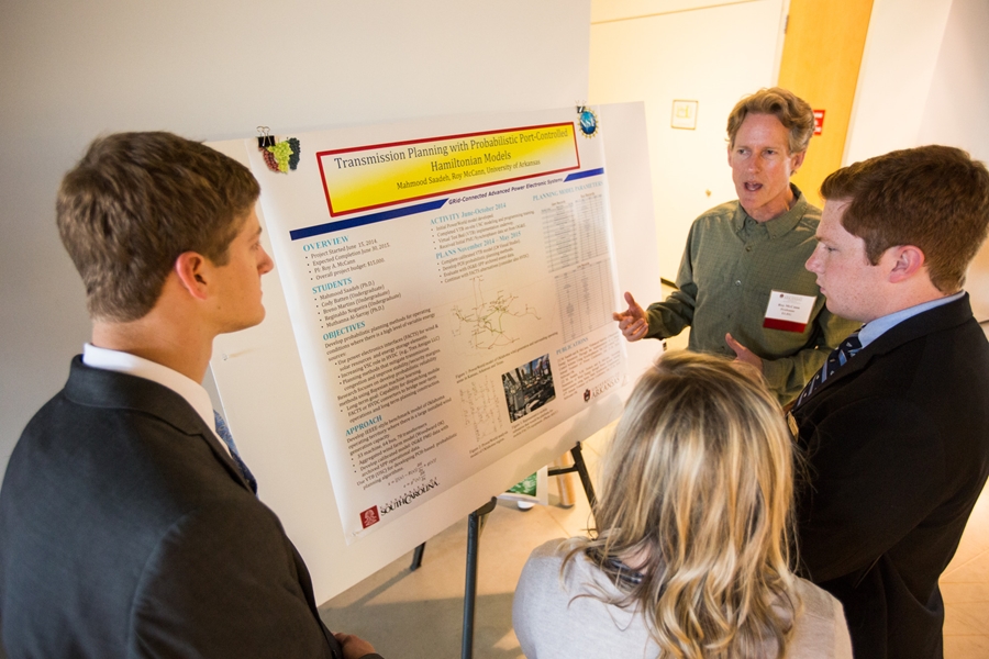 Researchers explain and discuss their work at a recent Research Showcase.