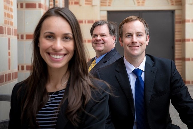 From left: Flavia Araujo, Michael Dunavant, and Jared Greer of Lapovations LLC at the Rice University Business Plan Competition.