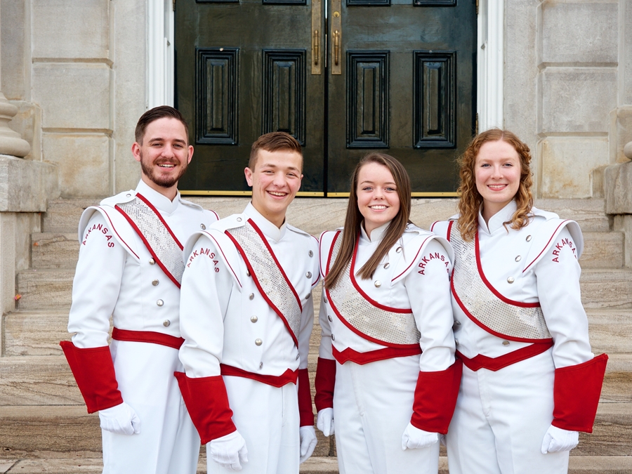 The 2019-20 Razorback Marching Band Drum Majors Connor Pocta, Tyler Osterman, Madison Spyres and Katie Craven.