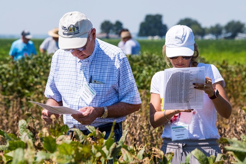 Glenn Buss and Luciana Rosso, both of Virgina Tech University, tour the USDA Uniform Soybean Nurseries at the Division of Agriculture's Vegetable Research Station. The Division of Agriculture hosted the Southern Soybean Breeders Tour in Fayetteville in 2019.