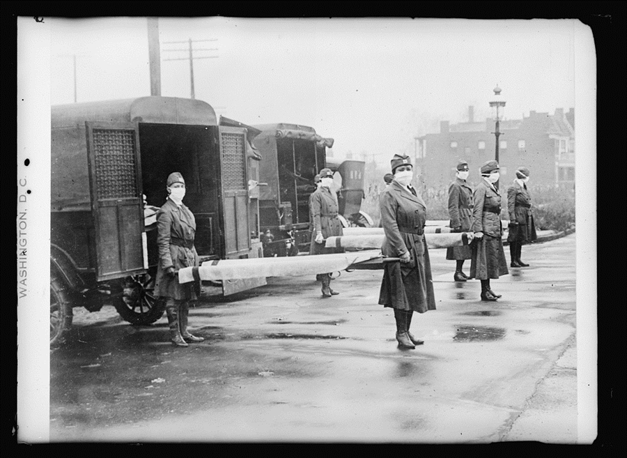 Members of the St. Louis Red Cross Motor Corps on duty during the 1918 flu pandemic. 