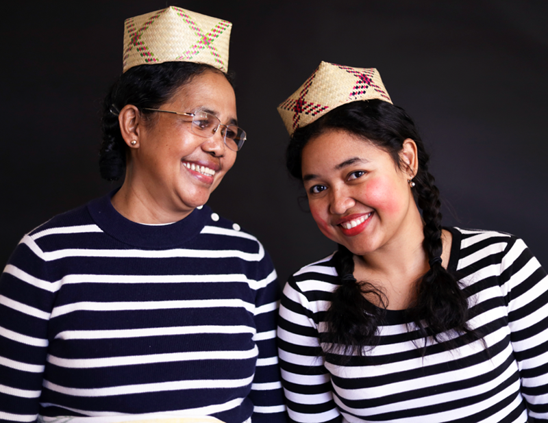 Doctoral student Francia Ravelombola (right) from Madagascar and her mother (left). Ravelombola said it is customary to wear so much blush to show that &quot;you aren't married!&quot;