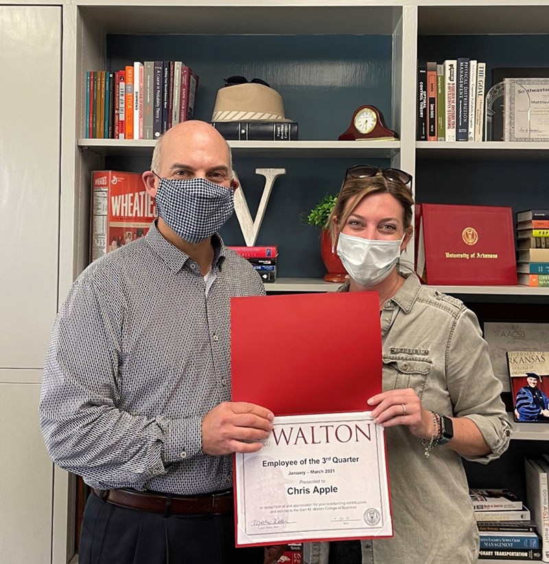 Dean Matt Waller recognizes Christine Apple as the Employee of the Third Quarter for Walton College.