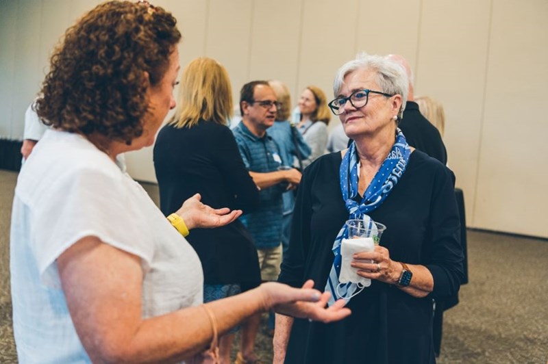 Alumna and "Nurses Crushing COVID" founder Lori Mahler (left) chats with Susan Patton, chair of the Eleanor Mann School of Nursing.
