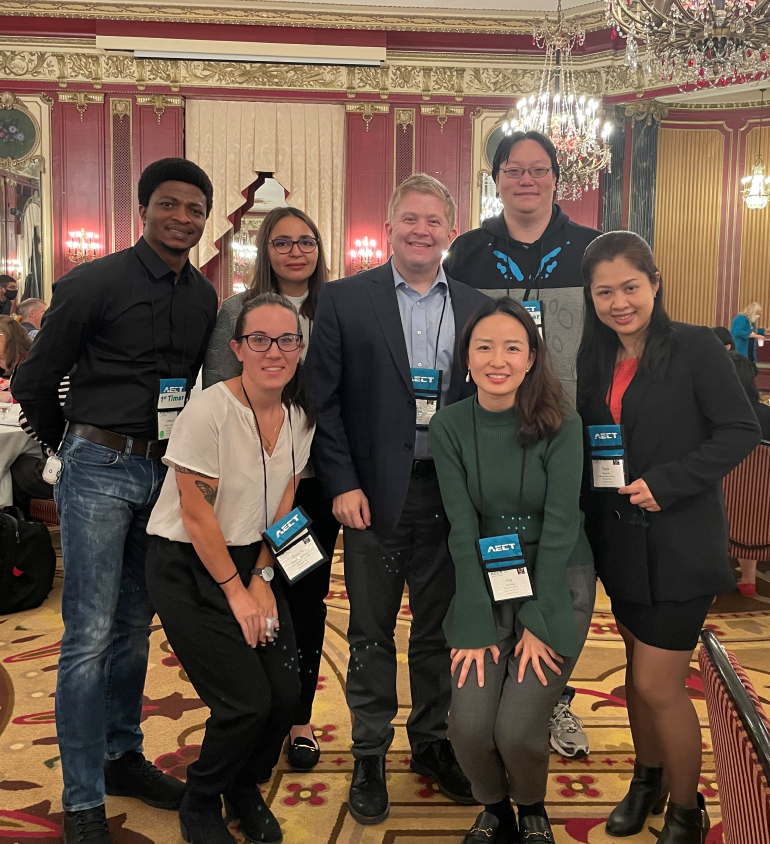Dennis Beck (back row, second from right) poses with students and early career faculty interested in his work. The photo was taken at the Association for Educational Communications and Technology's annual conference in Chicago.