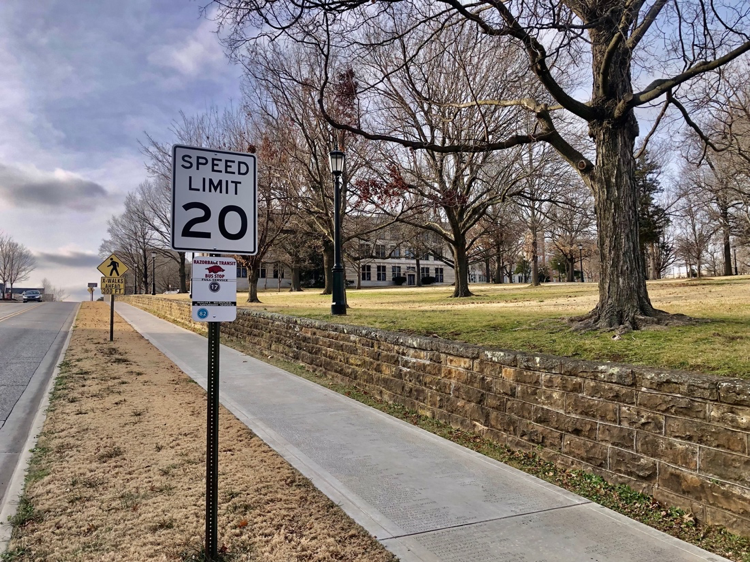 Speed limit signs on streets near campus have been updated with new reduced speed limits. Take your time out there.