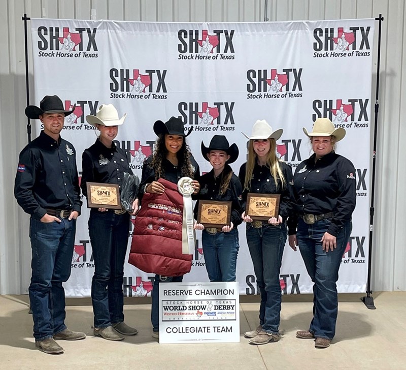 The ranch horse team, made up of animal science students and coached by Jordan Shore and Sidney Dunkel, shows off awards from winning the Stock Horse of Texas World Show Division 2 championship.
