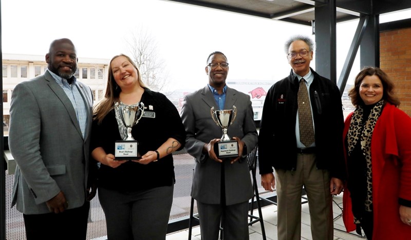 From left, Bumpers College Dean Deacue Fields, U of A Global Campus Financial Affairs Specialist Shelly Pryor, UAPD Cpl. Allen Porter, UAPD Capt. Gary Crain and United Way of NWA Vice President of Corporate and Community Relations Christina Hinds.