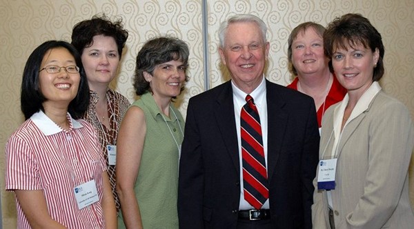 In October 2007, Donnie Dutton, dean of the School of Continuing Education and Academic Outreach (now Global Campus), received the Arkansas Distance Learning Association's lifetime achievement award at the annual conference in Hot Springs. With him are, from left, instructional designers at the time Miran Kang, Rebecca Leighton, Liz Stover and Elaine Terrell and Cheryl Murphy, formerly program coordinator of educational technology and now U of A vice provost for distance education.