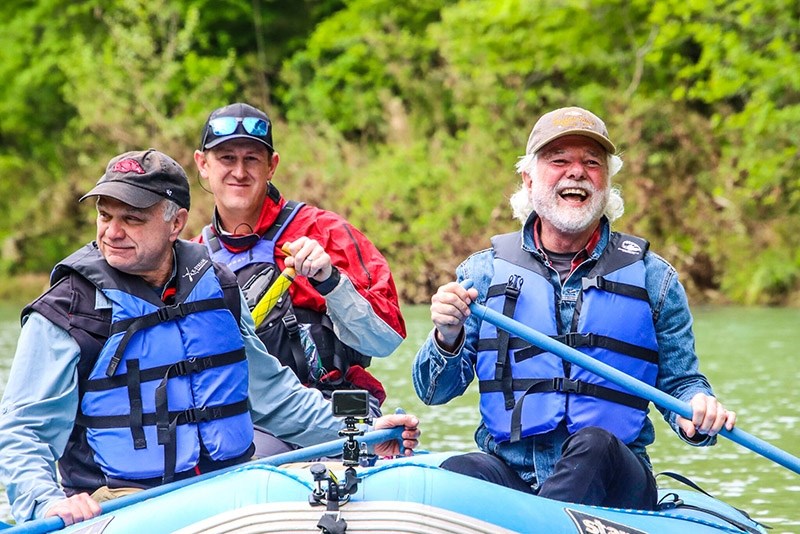 Chuck Leavell, host of "America's Forests with Chuck Leavell," at right, floats the Buffalo National River with Joe Fox, Arkansas state forester, at left. Two episodes of the PBS series were filmed in Arkansas last year.