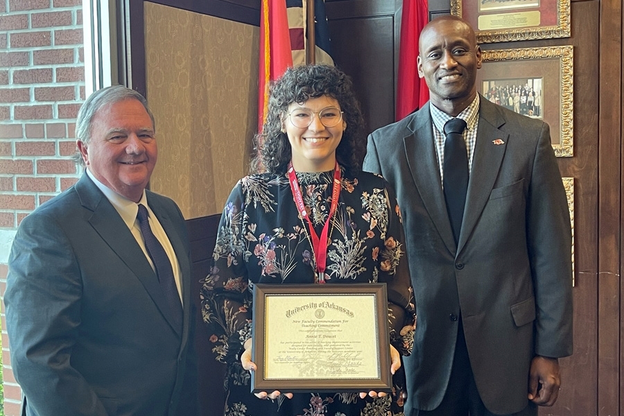 From left: Interim Provost Terry Martin; Anne Doucet, assistant professor of world languages, literatures and cultures; and interim Chancellor Charles Robinson.