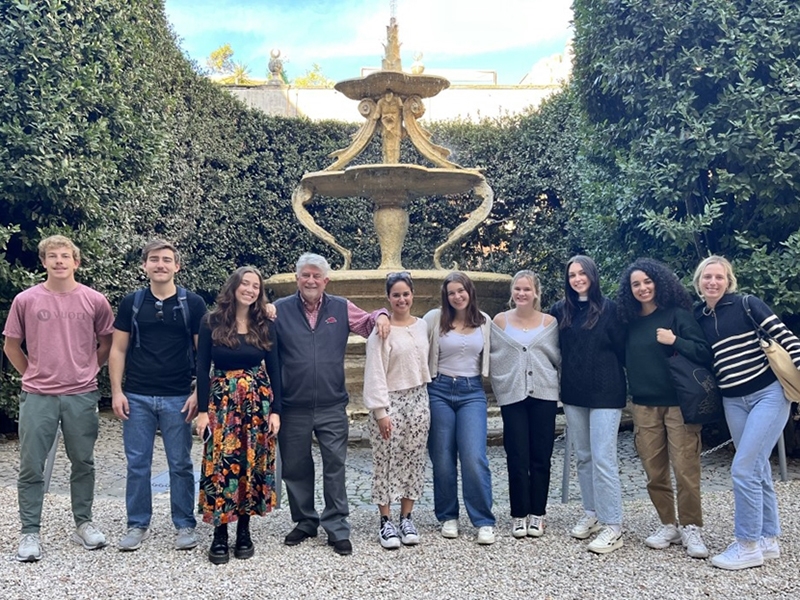 Professor Larry Foley (fourth from left) with students in his multimedia storytelling class at the Palazzo Taverna, home of the university's Rome Center.