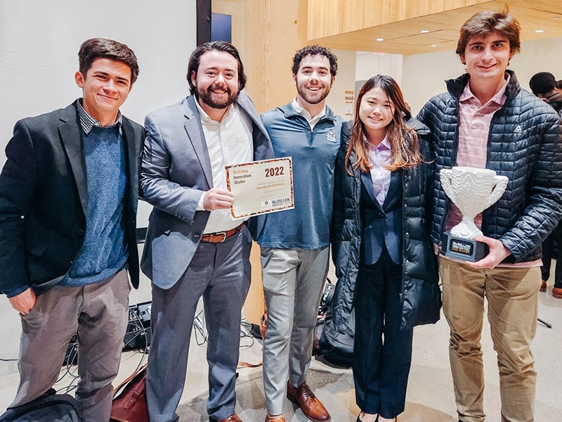 Members of the overall winning team at the McMillon Innovation Studio's Fall 2022 Demo Day pose with the trophy from the competition. Pictured (from left) are Jack Norris, Jarrett Hobbs, Mason Moser, Ami Ino and Joseph Wilkin.