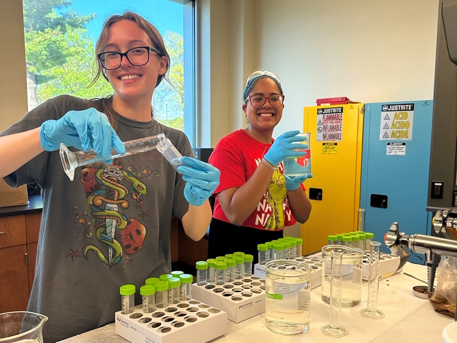 Jacqueline Todd, left, and Ireyra Tamayo conduct water quality tests from samples taken in the Beaver Lake watershed as part of ongoing water quality studies with Shannon Speir, assistant professor of water quality with the Arkansas Agricultural Experiment Station.