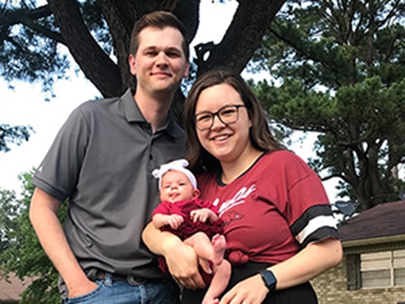 Dakotah Cooper, pictured with his wife, Natalie, and baby, Piper, earned his Master of Science in Operations Management in spring 2022 at about the same time he and Natalie became parents to baby Piper. The degree's online method of delivery meant he could advance in his career and take advantage of opportunities for the future without disrupting his family or leaving his job.