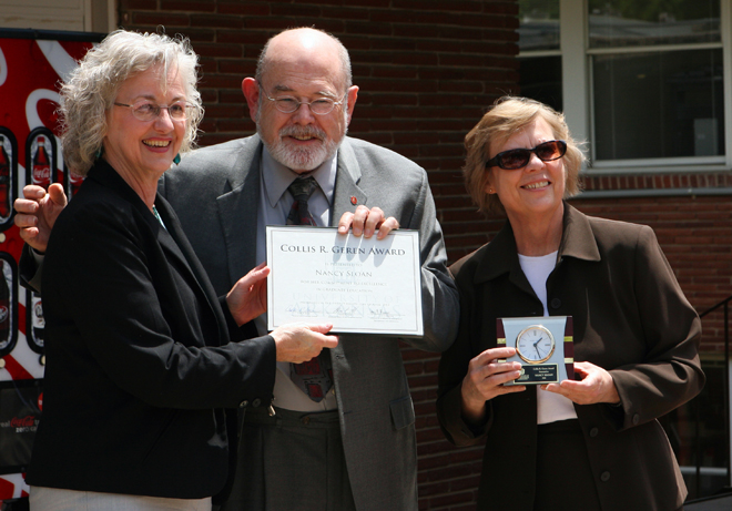Nancy Sloan, being presented the "Collis R. Geren Award for Excellence in Graduate Education" from Dean Collis Geren and Associate Dean Patricia Koski.