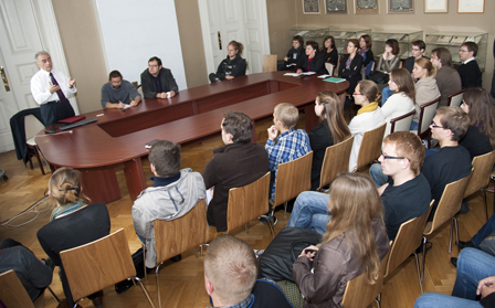 Mounir Farah, professor of curriculum and instruction, speaks last month with students at Vytautas Magnus University in Lithuania. 
