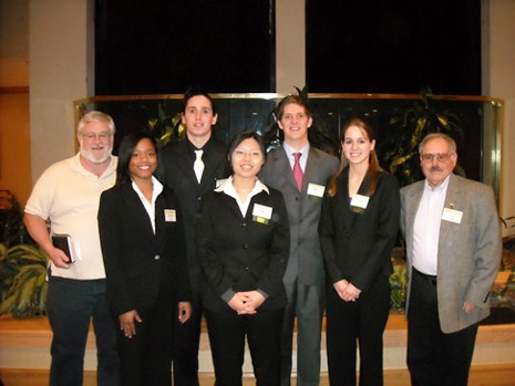 Walton College second-place team in the 2010 Operation Stimulus includes (l.to r.)  John Ozment, Ashleigh Toatley, Kameron Wilson, Yuki Hatano, Brik Heil, Sabrina Wade and Jim Crowell.