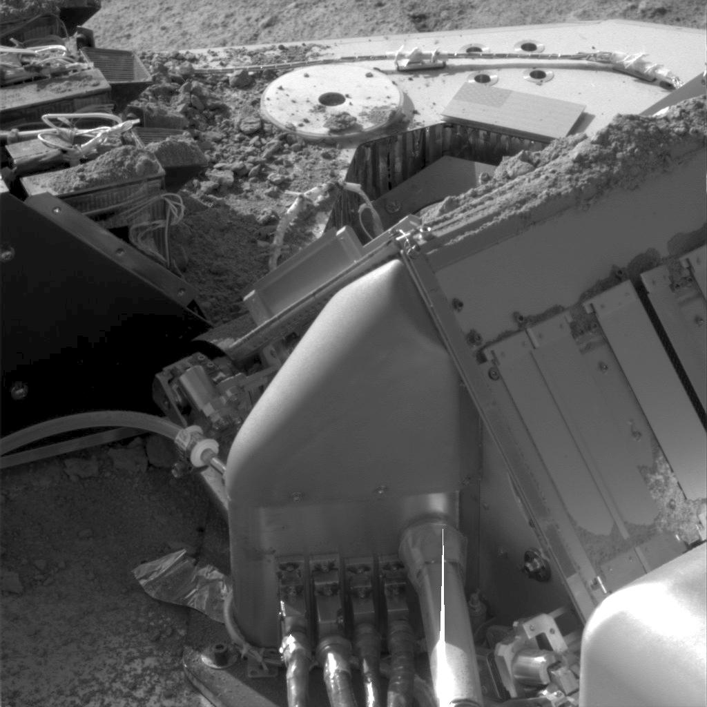 This image, taken by the Surface Stereo Imager of NASA&#39;s Phoenix Lander, shows Martian soil piled on top of the spacecraft&#39;s deck and some of its instruments. Researchers at the University of Arkansas have used data from the Phoenix Lander to show that salts formed from perchlorates discovered there have the potential to be found in liquid form under the conditions on present-day Mars.

Image credit: NASA/JPL-Caltech/University of Arizona/Max Planck Institute
